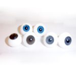 SOLID GLASS ROUND PAPERWEIGHT EYES